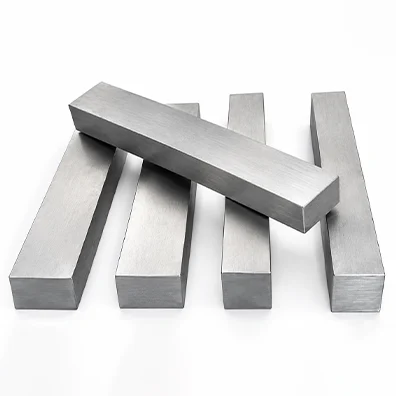 A stack of Aurum Overseas stainless steel square bars arranged for industrial supply and construction applications.